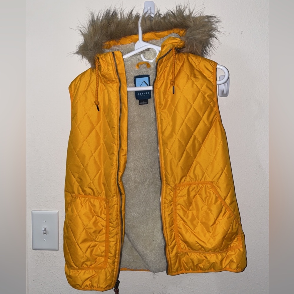 Mustard yellow puffer vest with fur hood. Size small